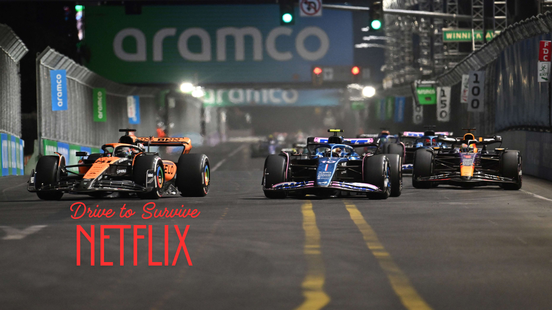 Formula 1 cars racing under floodlights during a night Grand Prix, featured in Netflix’s Drive to Survive series