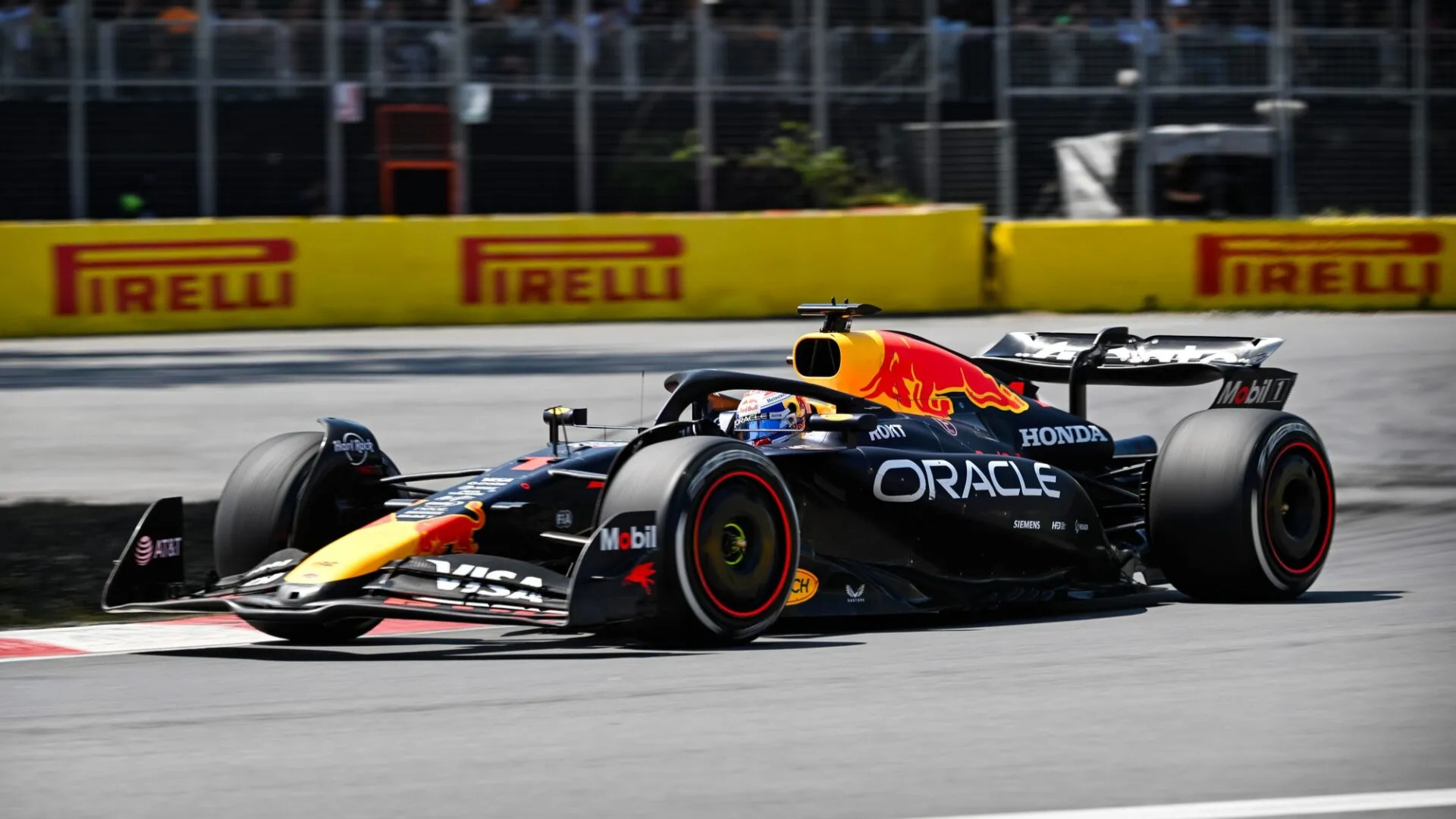 Max Verstappen navigating a corner in the Red Bull Racing F1 car, highlighting his struggles as a midfield driver in 2026.