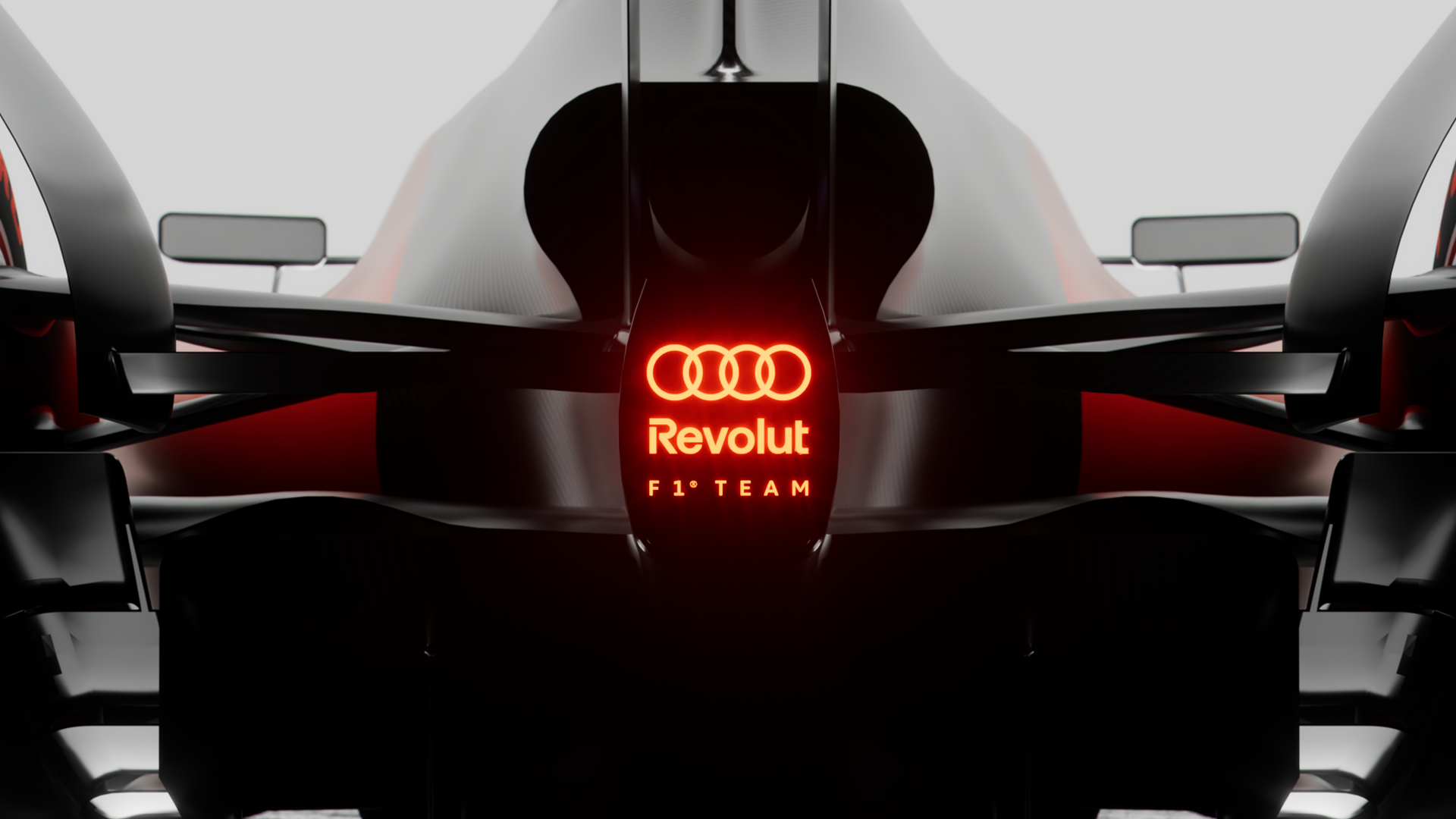 Close-up of the 2026 Audi Revolut F1 Team car nose featuring glowing red title sponsor logos.
